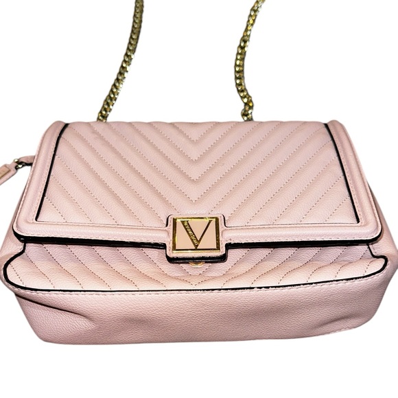 Victoria Secret purse has thick gold chain shoulder strap, magnetic snap pinkish